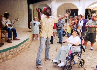 Photo of guide, mother in the wheelchair and other tour guests goes here.