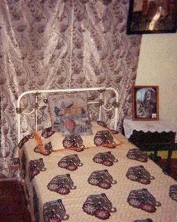 Photo of Bob Marley's childhood bedroom goes here.