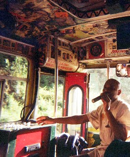 Photo of singing bus guide goes here.