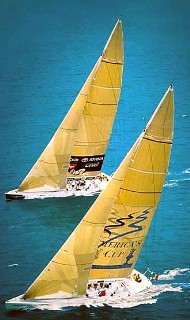 Photo of two yachts racing goes here.