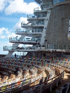 Photo of the Aqua Theater seating and one rock climbing wall. 