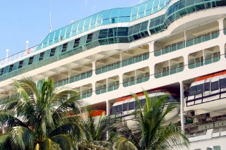 Photo of cruise ship docked at Port Everglades goes here.