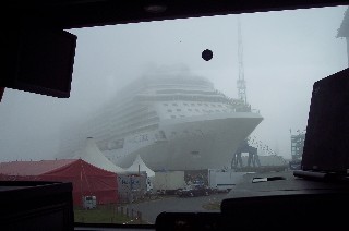 Photo of ship in the early morning fog as we were driving out of the shipyard.