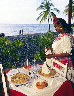 Photo of restaurant by the beach in St. Lucia goes here.