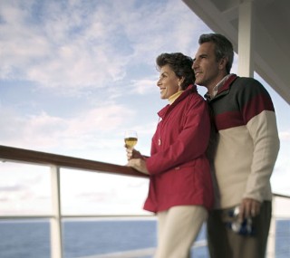 Phot o of couple on a balcony goes here.
