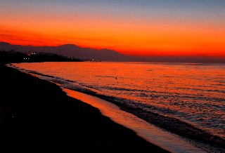 Photo of sunset on Trujillo Bay goes here.