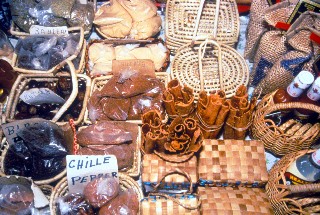 Photo of spices and baskets at the Castries market goes here.