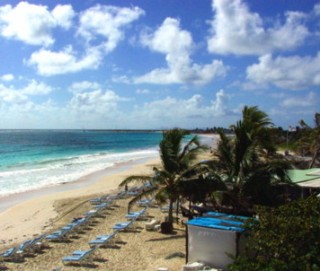 Photo of St. Maarten beach scene goes here.