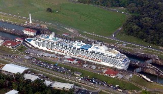 Photo of Coral Princess in the Panama Canal goes here.