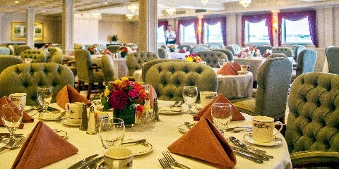 Photo of Queen of the Mississippi dining room goes here.*)