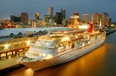 Photo of the Carnival Fantasy at dusk goes here.