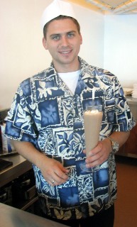 Photo of a crew member with a fresh, hand dipped milkshake goes here.