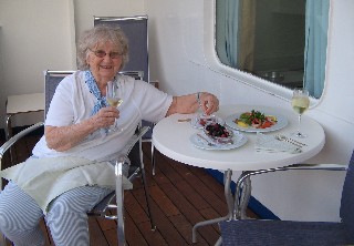 Photo of balcony with canapes and wine goes here.