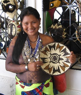 Photo of Indian woman and craft item goes here.