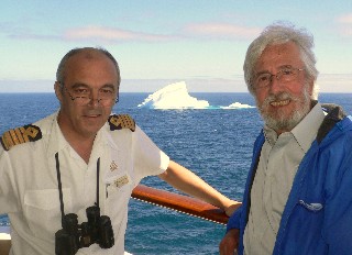 Photo of Captain with Jean Michel Cousteau and iceberg goes here.