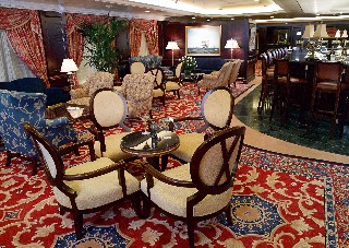 Photo of fresh carpeting on a Regatta-class vessel goes here.