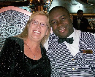 Photo of Nancy K and Chavez, her dining room server,  goes here. 