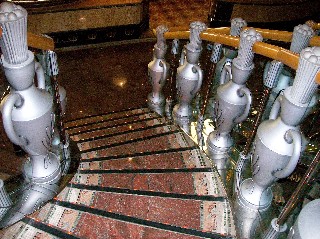 Photo of Carnival Legend interior staircase goes here.