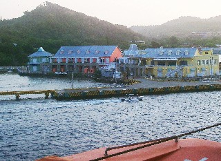 Photo of Belize City dock goes here.