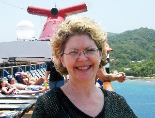 Photo of Shelley atop the Carnival Legend goes here. 
