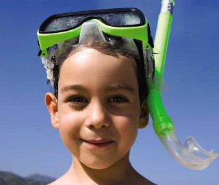Photo of kid with snorkel mask goes here.