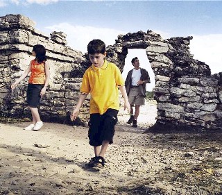 Photo of a family exploring the ruins goes here.