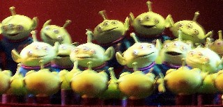 Photo of green alien inflatables goes here.