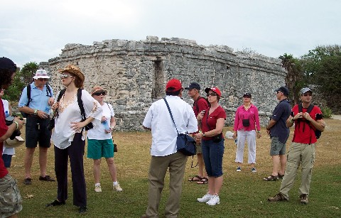 Photo of cruise visitors at Tulum goes here.