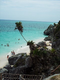 Photo of Tulum's cliffside locale goes here.