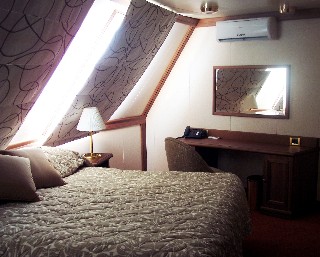 Photo of Grand Suite bedroom goes here.