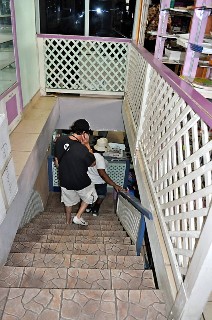 Photo of staircase down to basement of Book Palace goes here.