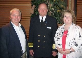 Photo of TJ, the captain and Carol goes heere.