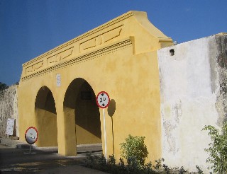 Photo of a gate through the city wall goes here.