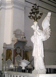 Photo of Cararra marble statue goes here.
