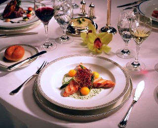 Elegant dinner photo goes here.