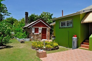 Photo of home with open-fire, outdoor kitchen